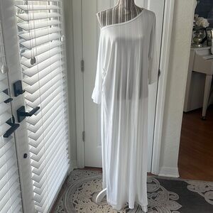 CBR ladies size medium but a loose med. Never been worn white dress or coverup.